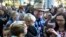 Ammon Bundy, center, a son of Nevada rancher and states' rights figure Cliven Bundy, is greeted by family and friends at the U.S. District Courthouse in Las Vegas after being released from federal custody, Nov. 30, 2017. A federal judge ordered Bundy freed to house arrest during his trial on charges in an armed standoff with U.S. Bureau of Land Management agents near the Bundy ranch in Nevada. 