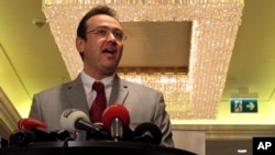 FILE - Syrian National Coalition spokesman Khalid Saleh