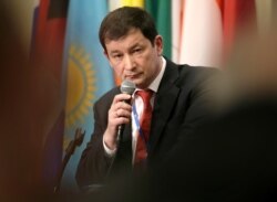 Russian Deputy Ambassador to the U.N. Dmitry Polyanskiy speaks to reporters after a security council meeting, Nov. 26, 2018.