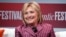 FILE - Former Secretary of State Hillary Clinton talks with Jeffrey Goldberg, editor in chief of The Atlantic, during The Atlantic Festival, in Washington.
