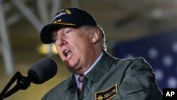 President Donald Trump speaks while aboard the nuclear aircraft carrier Gerald R. Ford at Newport News Shipbuilding in Newport, Virginia, March 2, 2017. 