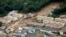 An aerial view shows a landslide that swept through a residential area at Asaminami ward in Hiroshima, western Japan, in this photo taken by Kyodo, Aug. 20, 2014.