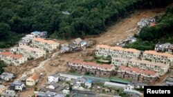 Tanah longsor yang menyapu daerah permukiman di Asaminami, Hiroshima di Jepang bagian barat (20/8).