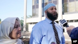 FILE - Adnan Syed and his mother, Shamim Rahman, talk with reporters as they arrive at Maryland's Supreme Court in Annapolis, Oct. 5, 2023.