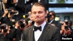 Aktor Leonardo DiCaprio tiba di tempat penayangan film 'The Great Gatsby' yang menjadi pembuka Festival Film Cannes ke-66 (16/5). (Foto: Reuters)