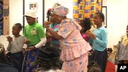 People celebrate Kwanzaa at the Anacostia Community Museum in Southeast Washington