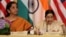 FILE - India's then-minister of commerce and industry, now minister of defense, Nirmala Sitharaman (L) and foreign minister Sushma Swaraj are seen at a U.S-India Strategic & Commercial Dialogue plenary session at the State Department, in Washington, Sept. 22, 2015.