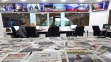 FILE - Newspapers rest on a table at a private television broadcaster in Algiers, Tuesday, March 19, 2024.