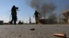 Fighters from the Free Syrian Army fight against the Islamic State (IS) group jihadists on the outskirts of the northern Syrian town of Dabiq, on Oct. 15, 2016.