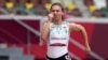 Krystsina Tsimanouskaya, dari Belarus, saat bertanding lari 100 meter putri di Olimpiade Musim Panas 2020, 30 Juli 2021. 