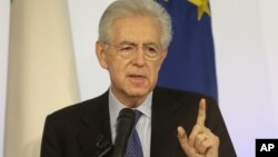 talian Premier Mario Monti gestures as he speaks during a news conference in Rome, December 23, 2012. 