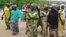 Wasu daga cikin 'yan matan Chibok da suka tsere daga hanun 'yan boko haram da  suka yi garkuwa da su 