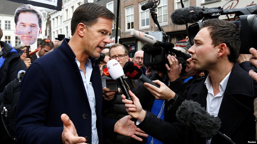 Dutch Prime Minister Mark Rutte of the VVD Liberal party speaks to the media as he campaigns for the 2017 Dutch election in Breda, Netherlands, March 11, 2017. 