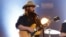 Musician Chris Stapleton performs "Second One To Know" at the 52nd Academy of Country Music Awards in Las Vegas, Nevada, Feb. 4, 2017.