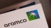 Logo Saudi Aramco terlihat di luar Khurais, Arab Saudi, 12 Oktober 2019. (Foto: Maxim Shemetov/Reuters)