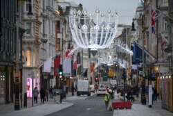 General view of a near empty New Bond Street, in London, Tuesday, Dec. 22, 2020.