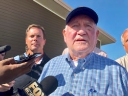 U.S. Agriculture Secretary Sonny Perdue speaks to reporters at an Ag Policy Summit, Aug. 28, 2019, in Decatur, Ill.