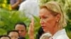 Foreign judge Agnieszka Klonowiecka-Milart takes an oath during the swearing in ceremony at the royal palace in Phnom Penh July 3, 2006. Top Buddhist priests swore in Cambodian and foreign judges on Monday for the trials of surviving Khmer Rouge leaders a