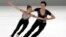 FILE - Ryom Tae Ok and Kim Ju Sik of North Korea compete during the pairs short program at the Figure Skating-ISU Challenger Series in Oberstdorf, Germany, Sept. 28, 2017. 