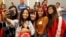 FILE - Rep. Jacky Rosen, D-Nev., center, poses for a selfie with high school students at an event put on by the Asian Community Development Council in Las Vegas, Sept. 29, 2018. 