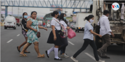 Estudiantes transitan por una céntrica calle de Managua, Nicaragua. Agosto de 2021. [Fotografía: Houston Castillo Vado]