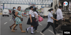 Estudiantes transitan por una céntrica calle de Managua, Nicaragua. Agosto de 2021. [Fotografía: Houston Castillo Vado]