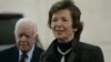 FILE - Former Irish President Mary Robinson, right, and former U.S. President Jimmy Carter speak to press in the West Bank city of Ramallah, Oct. 20, 2010. 
