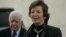 FILE - Former Irish President Mary Robinson, right, and former U.S. President Jimmy Carter speak to press in the West Bank city of Ramallah, Oct. 20, 2010. 