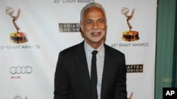 FILE - Actor Ron Glass arrives at the 65th Emmy Awards Nomination Celebration at the Academy of Television Arts and Sciences in Los Angeles, Sept. 17, 2013. Glass, best known for his role as Ron Harris in "Barney Miller" has died at age 71. 