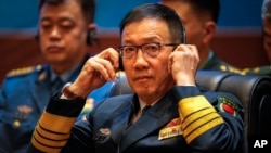 FILE - Chinese Defense Minister Dong Jun listens during the ASEAN- China Defence Ministers' informal Meeting in Vientiane, Laos, Nov. 20, 2024. 