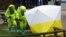 The forensic tent, covering the bench where Sergei Skripal and his daughter Yulia were found, is repositioned by officials in protective suits in the center of Salisbury, Britain, March 8, 2018.
