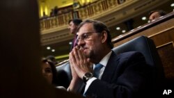 Penjabat Perdana Menteri Spanyol, Mariano Rajoy, menghadiri sidang parlemen Spanyol di Madrid (19/7). (AP/Francisco Seco)