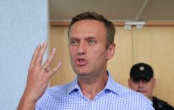 Russian opposition leader Alexei Navalny, who is charged with participation in an unauthorised protest rally, attends a court hearing in Moscow, July 1, 2019.