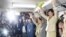 Yuriko Koike (R) and her supporters celebrate her win in the Tokyo Governor election in Tokyo, Japan, in this photo taken by Kyodo, July 31, 2016.