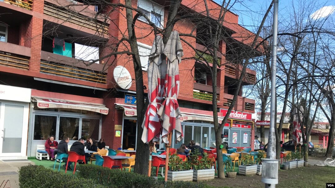 People in Banja Luka sitting in a cafe close to a school "Branko Ćopić", where coronavirus is detected 