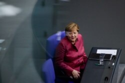 German Chancellor Angela Merkel attends a debate about German government's policies to combat the spread of the coronavirus and COVID-19 disease at the parliament Bundestag, in Berlin, Germany, Thursday, Oct. 29, 2020. (Photo/Markus Schreiber)