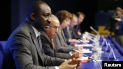 Mali's Foreign Minister Tieman Hubert Coulibaly addresses a news conference after a ministerial meeting in support of Mali at the EU Council in Brussels, February 5, 2013.