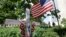 A makeshift memorial to slain Massachusetts Institute of Technology police officer Sean Collier is surrounded by foliage on the campus of MIT, July 23, 2014, in Cambridge, Massachusetts. Stephen Silva was the owner of the gun that killed Collier.