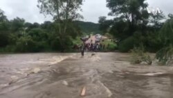 Crossing Flooded River Amid Fears of Drowning ...