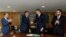 Brazil's President Jair Bolsonaro shakes hands with the new head of the federal police Rolando Alexandre de Souza at the Planalto Palace in Brasilia, Brazil, May 4, 2020.