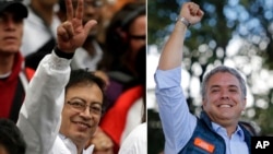 Dalam foto kombinasi, dua kandidat Presiden Kolombia, Gustavo Petro (kiri) dan Ivan Duque, keduanya di Bogota, Kolombia. Kolombia melaksanakan pemilihan presiden pada 27 Mei 2018.