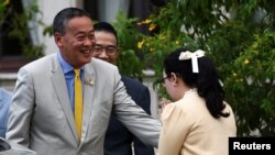 Thailand's recently dismissed prime minister, Srettha Thavisin, leaves after addressing members of media, at the Government House, in Bangkok, Thailand, Aug. 14, 2024.