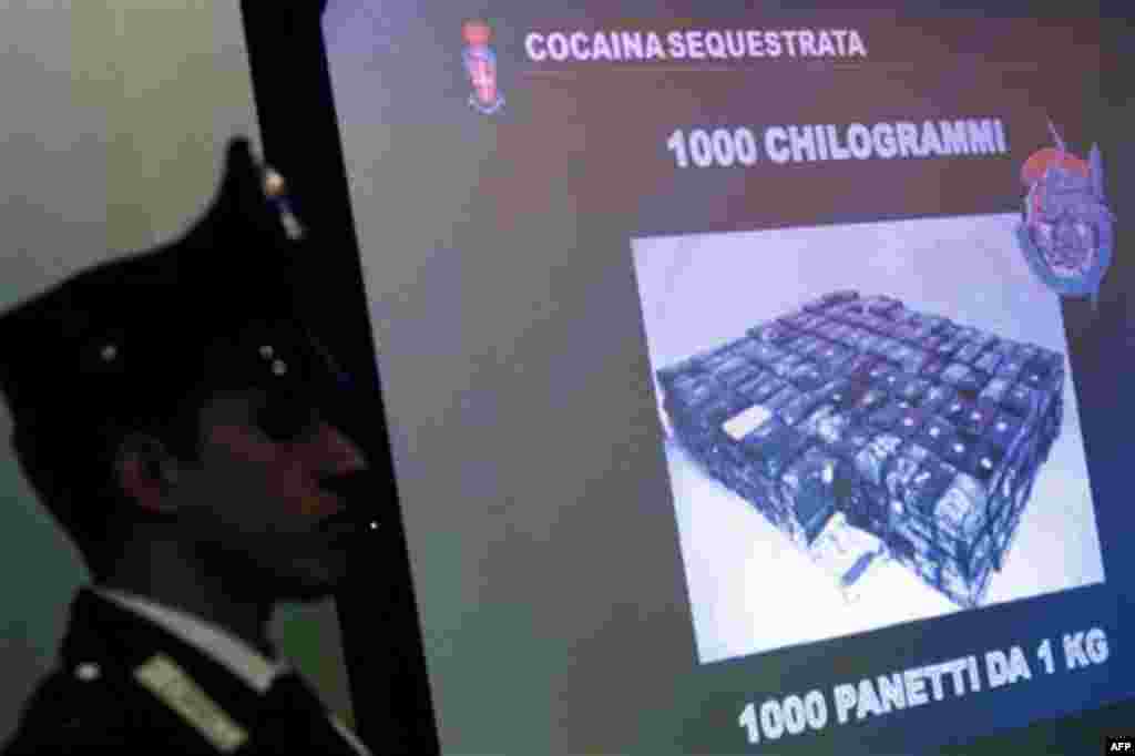 A picture showing part of 1,000 kilograms (2,200 pounds) of pure cocaine seized by the Italian police is shown to journalists during a press conference in Rome, Monday, Nov. 15, 2010. Italian police have seized 1,000 kilograms (2,200 pounds) of pure cocai