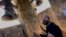 Joan Carles Osuna, a student of the Vall d'en Bas School of Bell Ringers, performs playing all four bronze bells at the church bell tower of the12th-century Sant Romà church, at the village of Joanetes, about two hours north of Barcelona, Spain, June 29, 2024. 