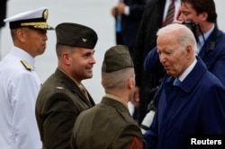 Presiden AS Joe Biden berbicara dengan personel militer di Pangkalan Udara Korps Marinir AS Iwakuni, di Iwakuni, Jepang, 18 Mei 2023. (Foto: REUTERS/Issei Kato)