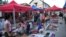 Handicraft and souvenir vendors wait for customers and tourists at the night market of Luang Prabang, October 18, 2009.