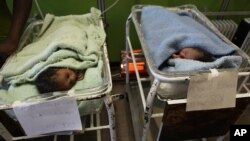 Newborn babies are seen in a government hospital in Harare, July 19, 2011.