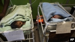 Newborn babies are seen in a government hospital in Harare, July 19, 2011.