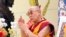 The Dalai Lama prays at the Dieu Ngu Temple in Westminster, Calif., June 18, 2016.