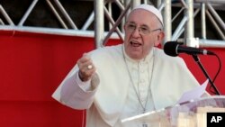 Pope Francis speaks to volunteers who worked at the World Youth Day event, before his departure, in Panama City, Jan. 27, 2019.